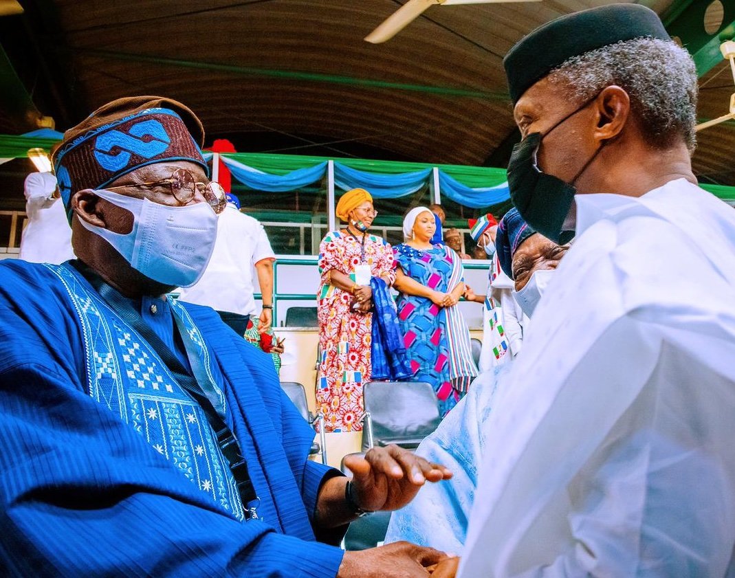 Tinubu shakes hands with Osinbajo as he wins APC presidential primary