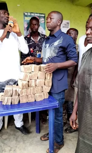 PDP delegate donates proceeds to community members, pays school fees for students