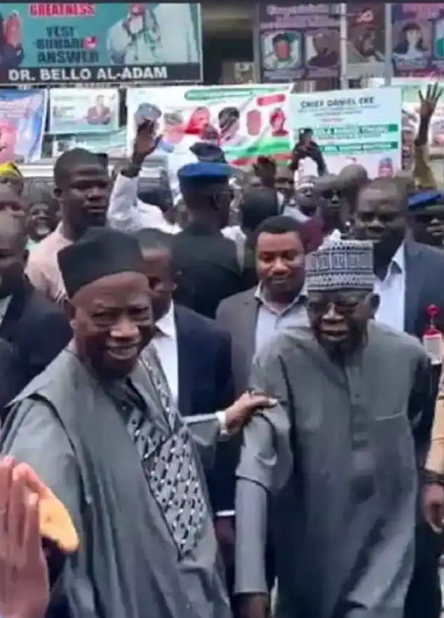 Nigerians React To A Picture Of Adamu Dragging Tinubu By Hand