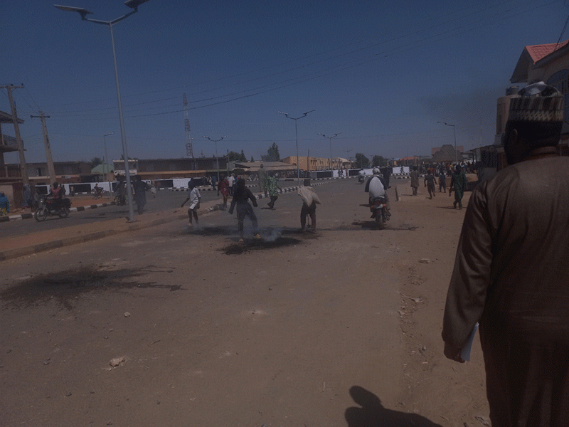 Protesters Barricade Roads, Stone Buhari’s Helicopter in Kano