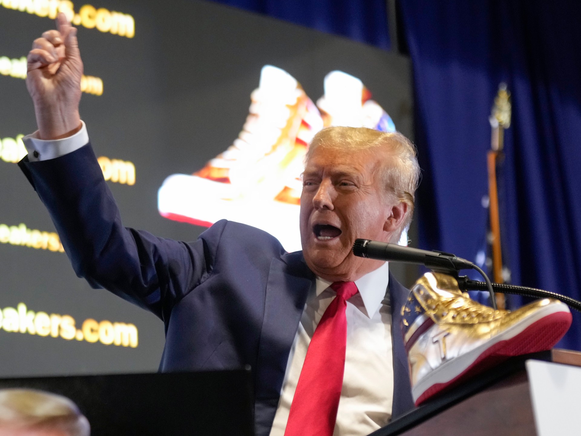 Boos and Cheers as Trump launches 9 Sneakers Line Day After 5m Fine