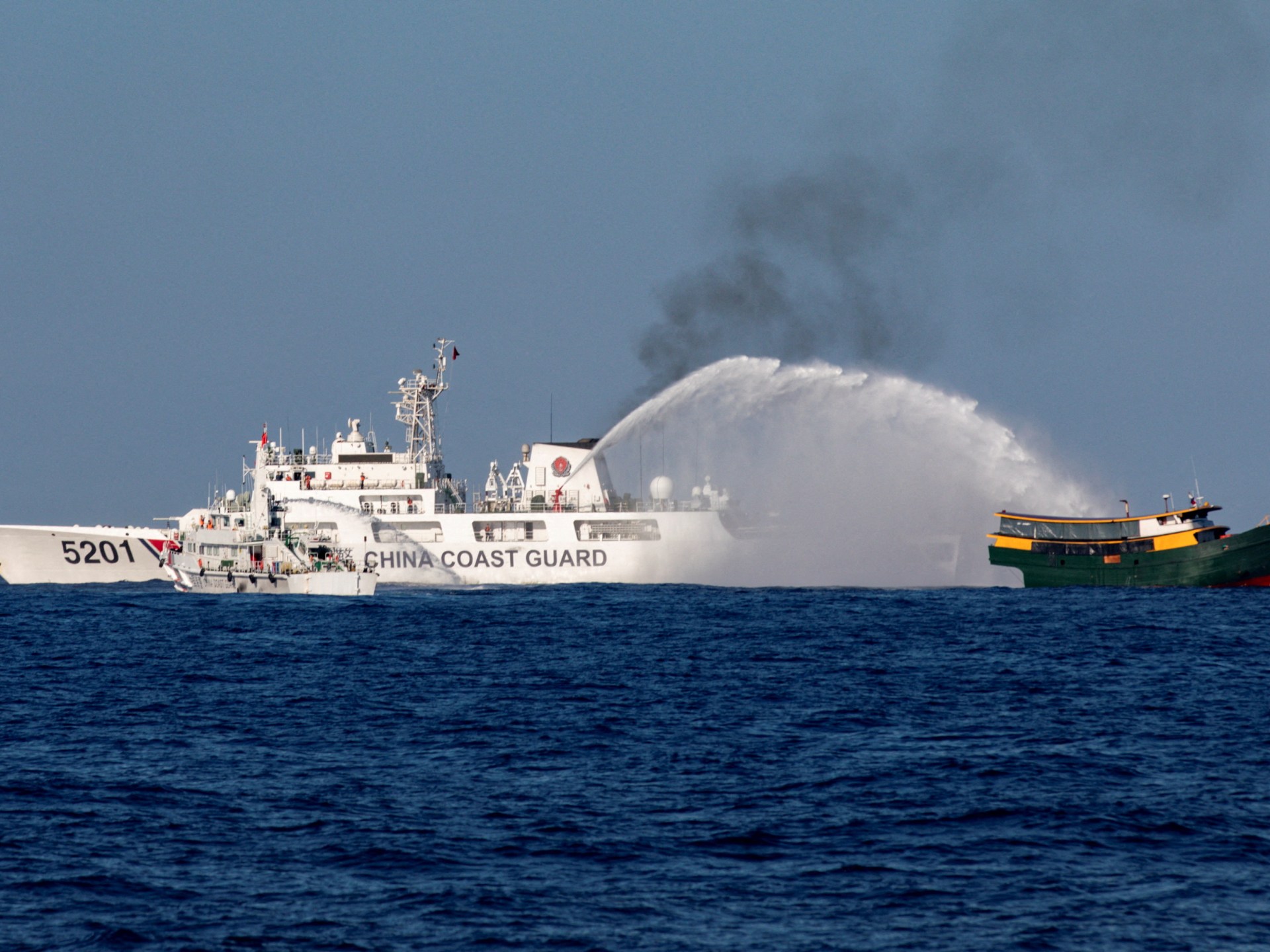 Philippines summons Beijing envoy over South China Sea water cannon attack