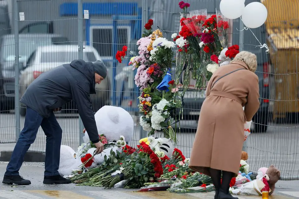 Moscow attack: Russia cancels friendly match as 115 people die