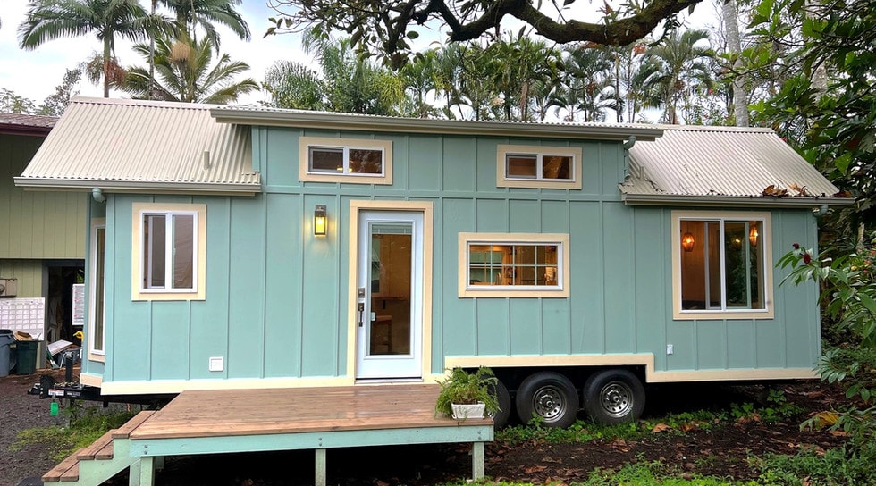 This Versatile 28-ft Tiny Home Looks Like a Relaxing Tropical Cabin Retreat