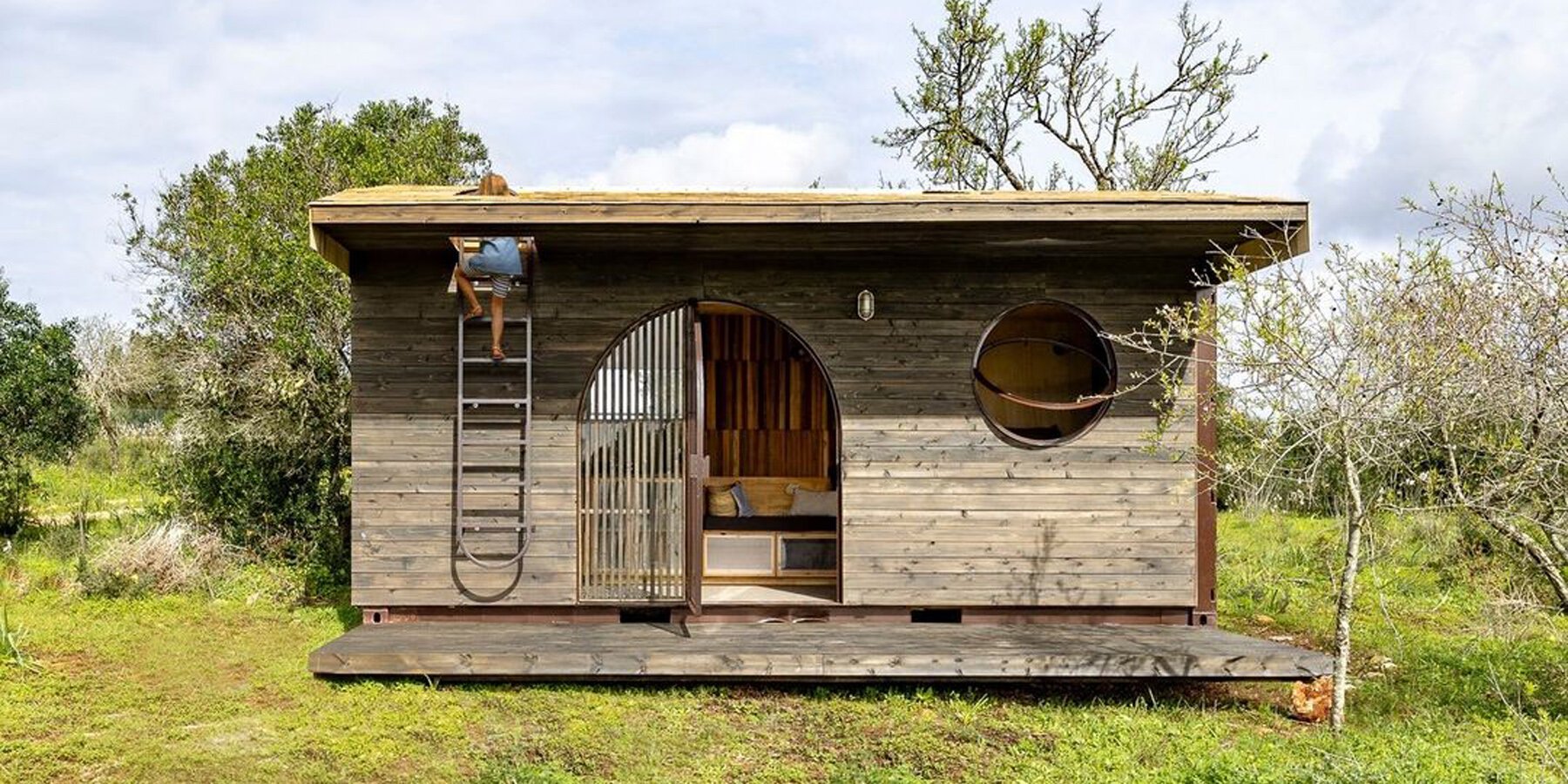 Madeiguincho repurposes old cargo container into tiny house