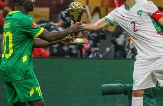 Hakimi was spotted begging Mané to let him touch the AFCON gold cup.