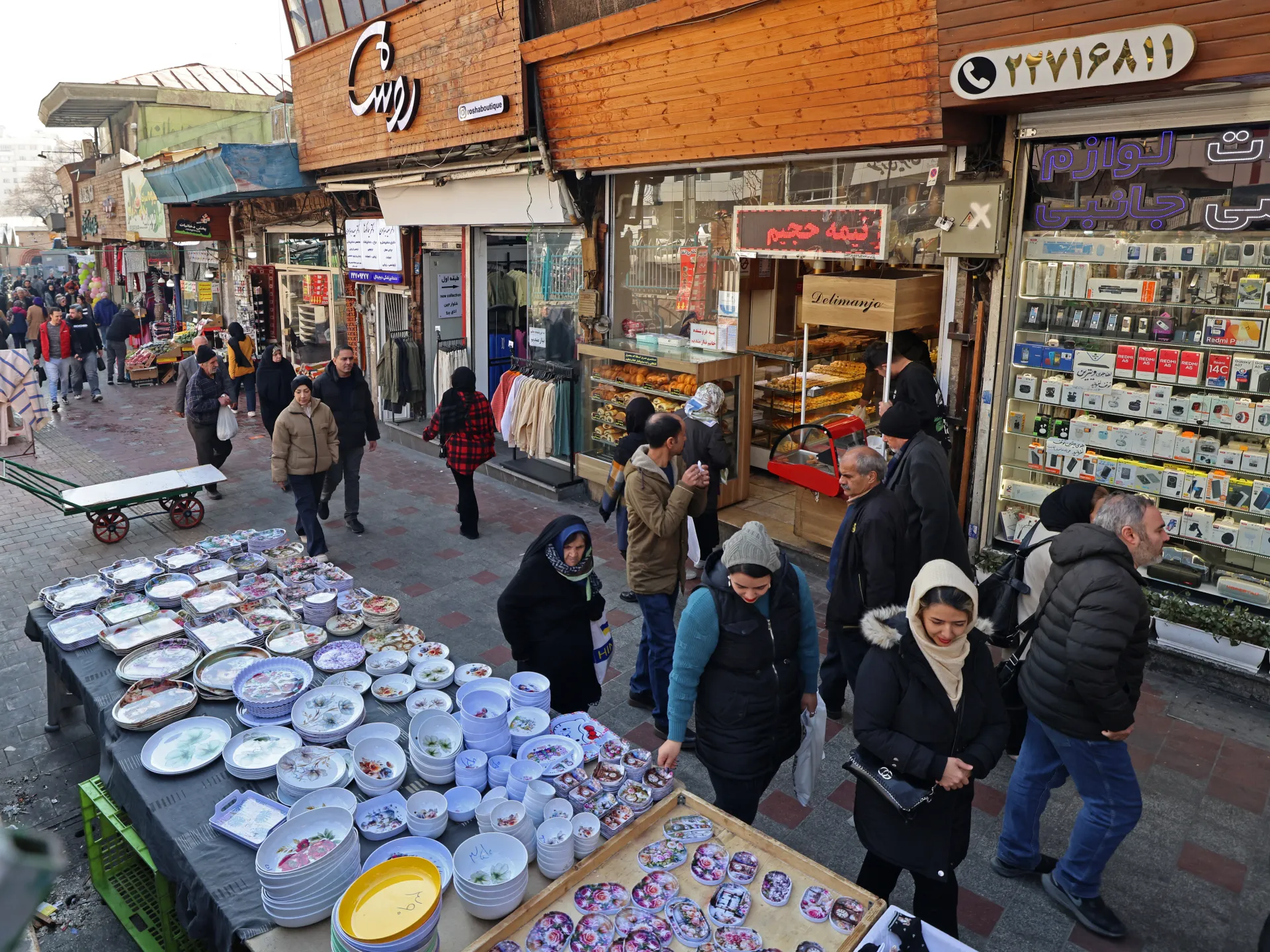 Iran delegates import powers as US war threats keep economy unstable | Politics News