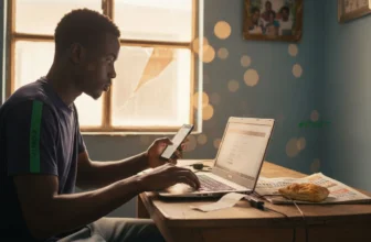 Nigerian youth making digital payment at home