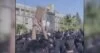 Iran protests ignite again; woman in Tehran says students are brave for demonstrating after bloody crackdown