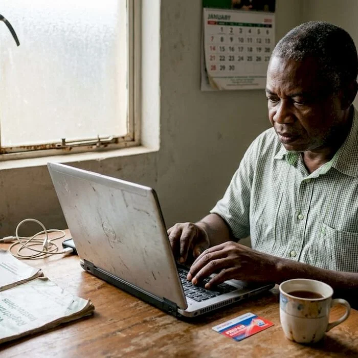 Nigerian man registering to vote at home
