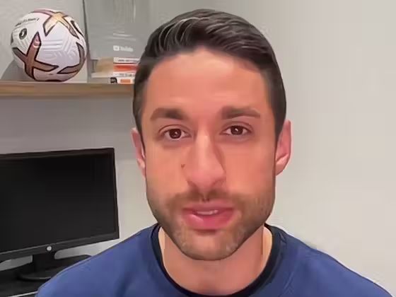 David Ornstein speaks on a webcam.