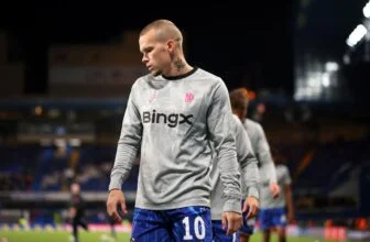 Mykhailo Mudryk looks pensive in a warmup.