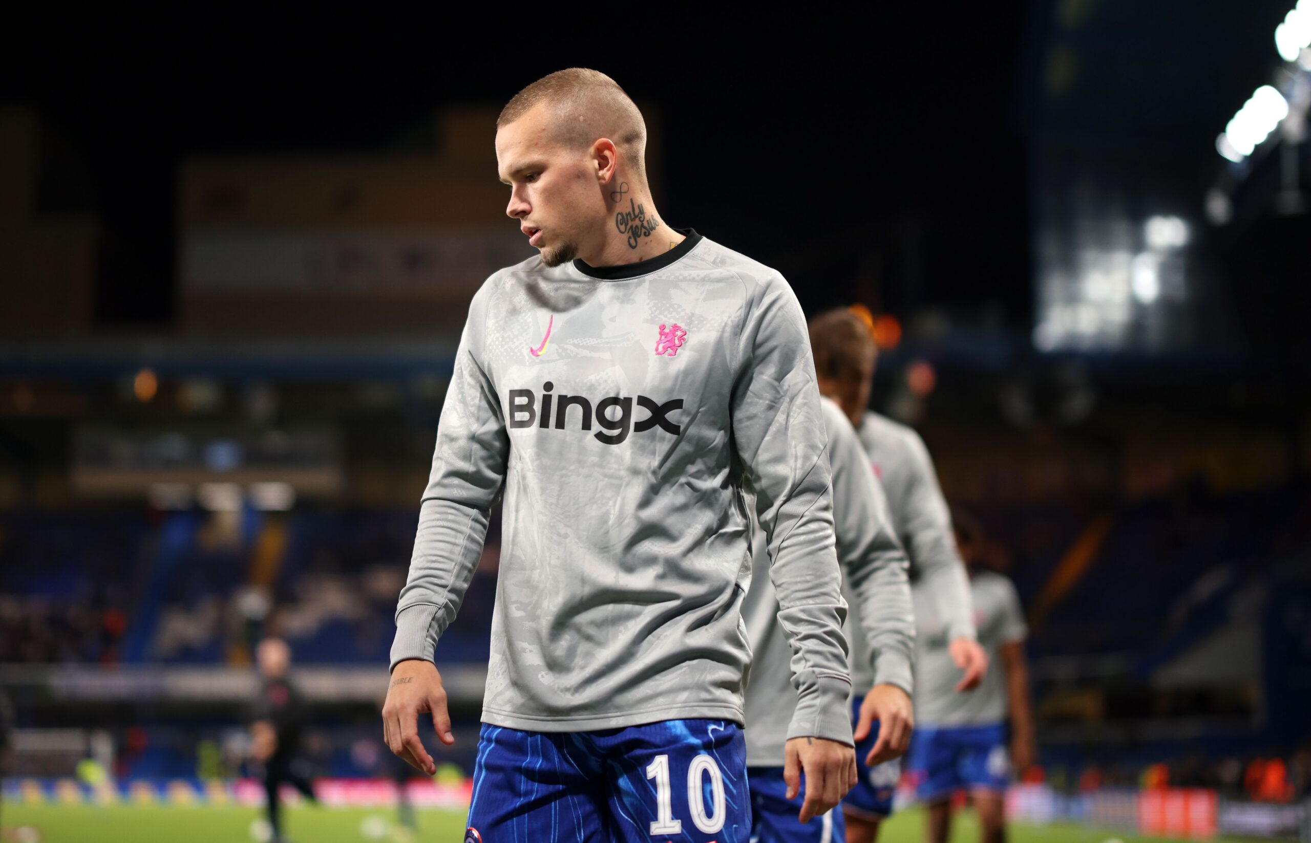 Mykhailo Mudryk looks pensive in a warmup.
