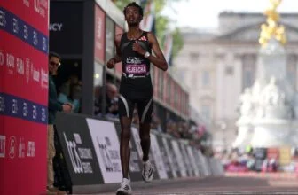 Yomif Kejelcha beat the world record marathon time but placed second : NPR