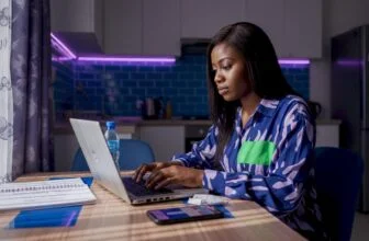 Woman submitting news article from Lagos apartment
