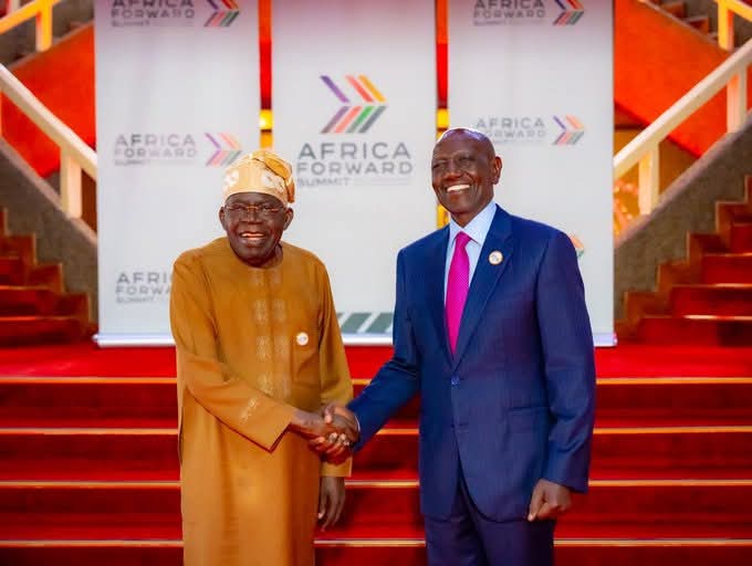 Tinubu, Ruto share moment at African Forward Summit