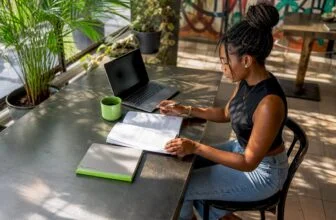Nigerian woman studying AI literacy at home