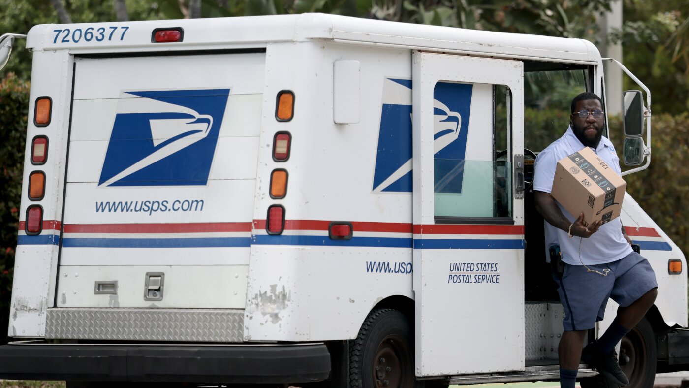 USPS is no longer expected to run out of money in 2027 : NPR