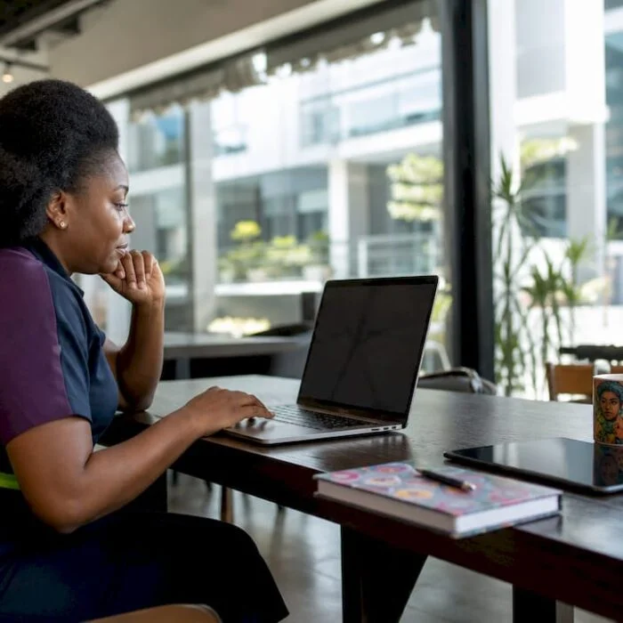 Nigerian woman marketing manager working on social listening