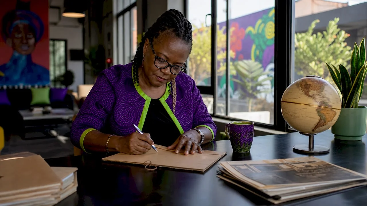 The Role of Digital Archives in Preservation and Access 1 Archivist labeling documents in digital archive room