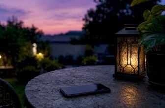 Smartphone on table with coffee and earbuds