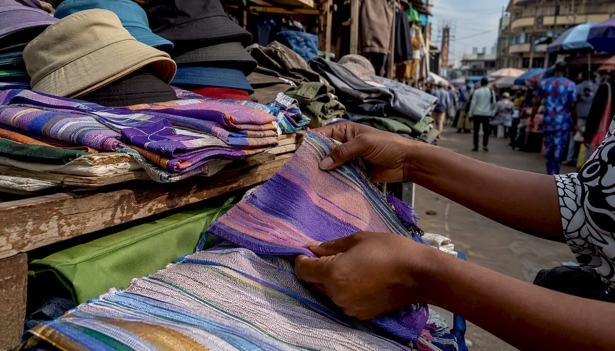 Close-up of Nigerian streetwear fabrics and accessories