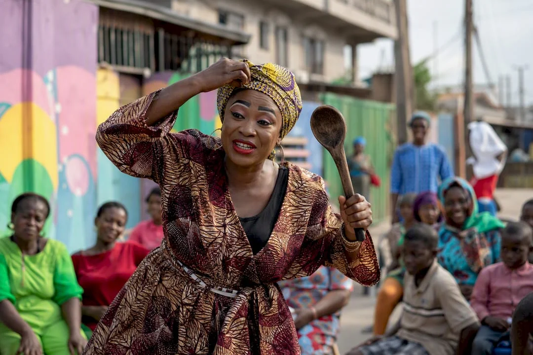 Nigerian Skit Makers Dominating Screens and Culture in 2026 4 Female Nigerian skit maker in costume adjusting headscarf