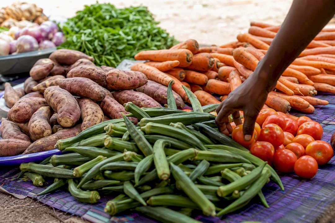 Nigeria's Cost of Living in 2026: What You'll Actually Spend 2 Fresh produce at Nigerian local market stall
