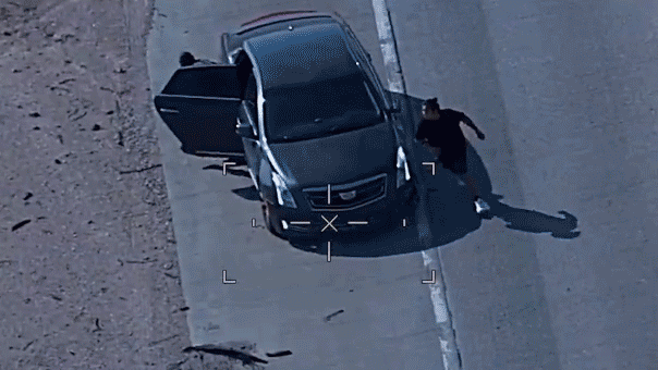Two suspected human smugglers bailed out of their vehicle gif